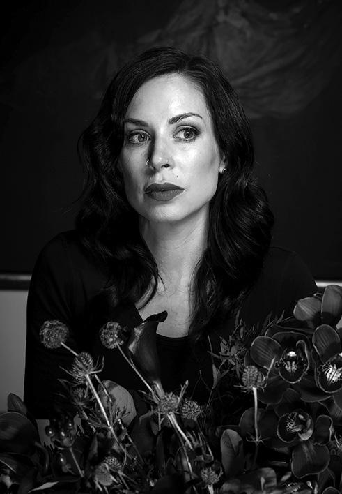 A grayscale portrait of the author, Jillian Lauren.